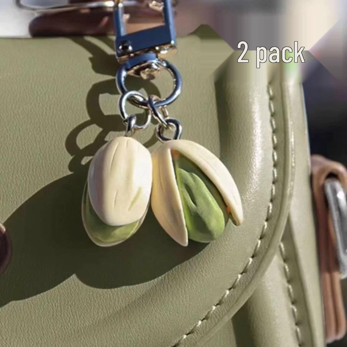 

Креативный брелок-подвеска «Фисташка» - Уникальный шарм для рюкзака и мини-украшение