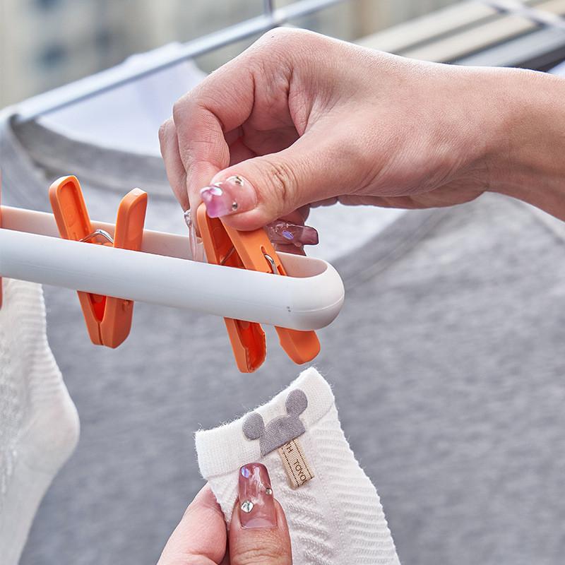 Stylowy japoński wieszak sześcioklipowy Wytrzymały plastik Na skarpetki, czapki, ubrania