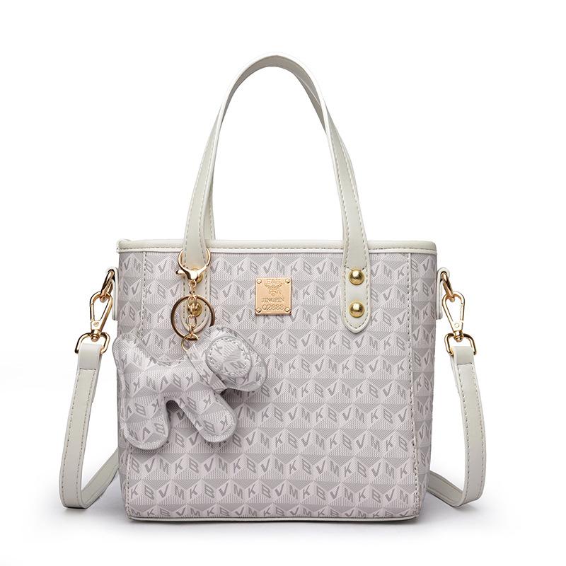 

Нишевая дизайнерская сумка женская 2025 осень новая модная сумка на плечо с принтом темпераментная сумка-ведро трендовая сумка-мессенджер бежевый