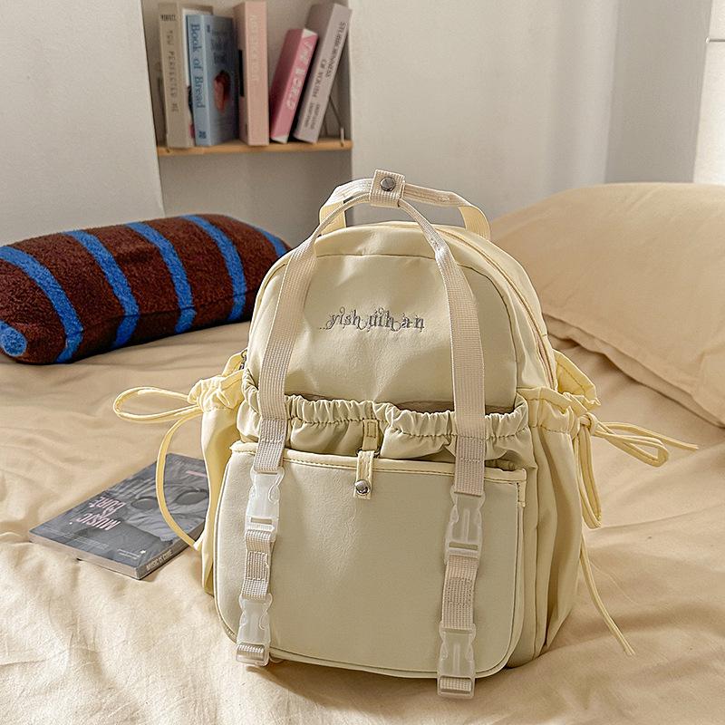 Student Rucksack mit großem Fassungsvermögen, lässig, mit Cartoon-Anstecknadeln, für Reisen und Schule