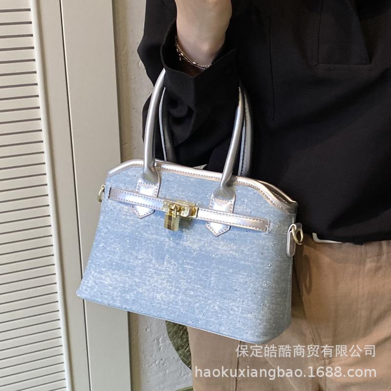 Hand bag women's 2025 new trendy high-end sense retro fashion versatile commuter shoulder bag crossbody bucket bag