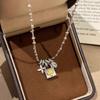 Light Luxury High-End Brushed Running Ring Four-Leaf Flower Lock Necklace Versatile Niche Design Medieval Seiko Collarbone Chain