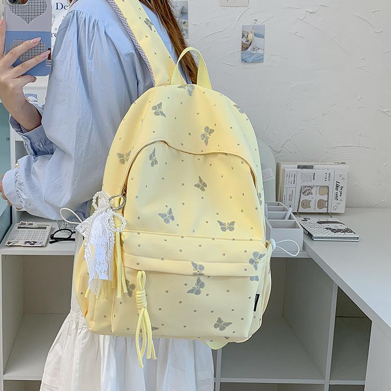 Mochila escolar nueva mochila escolar japonesa femenina estudiantes de secundaria mochila con estampado de mariposas de gran capacidad alto valor ligera versátil