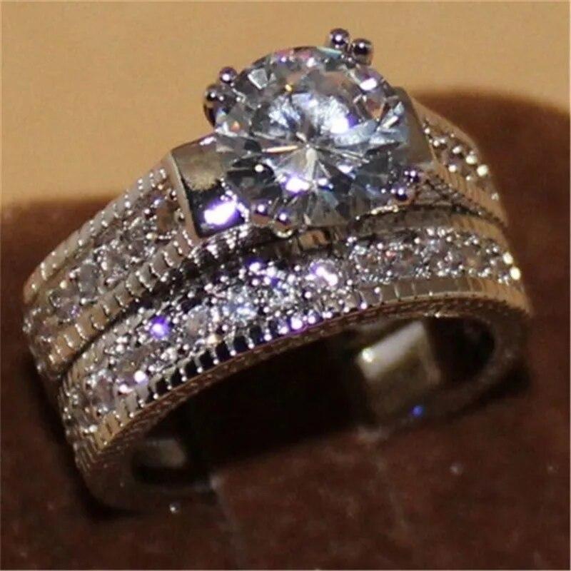 FDLK 2 stk Brudesett Elegante ringer for kvinner Bryllupsforlovelse Mote smykker med full skinnende kubikksirkon kvinnering