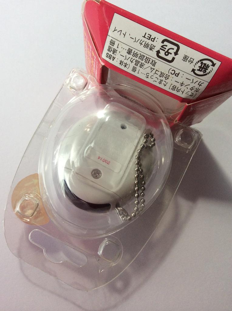Tamagotchi Plus White Black Button Is Back