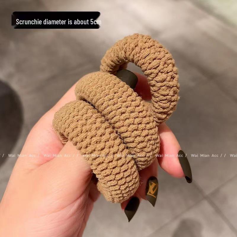 

Bold & Thick Elastic Rubber Hair Tie - High Ponytail & Durable Loop for Women