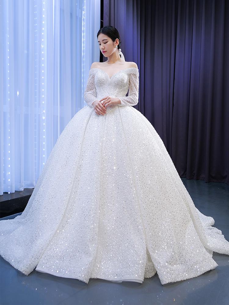 2026 French Wedding Dress: Retro One-Shoulder Long Sleeve with Heavy Beading and Long Train.