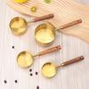 Stainless Steel Gold-Plated Measuring Spoons & Cups with Acacia Wood Handles, Precise Markings, 8-Piece Baking Tool Set.