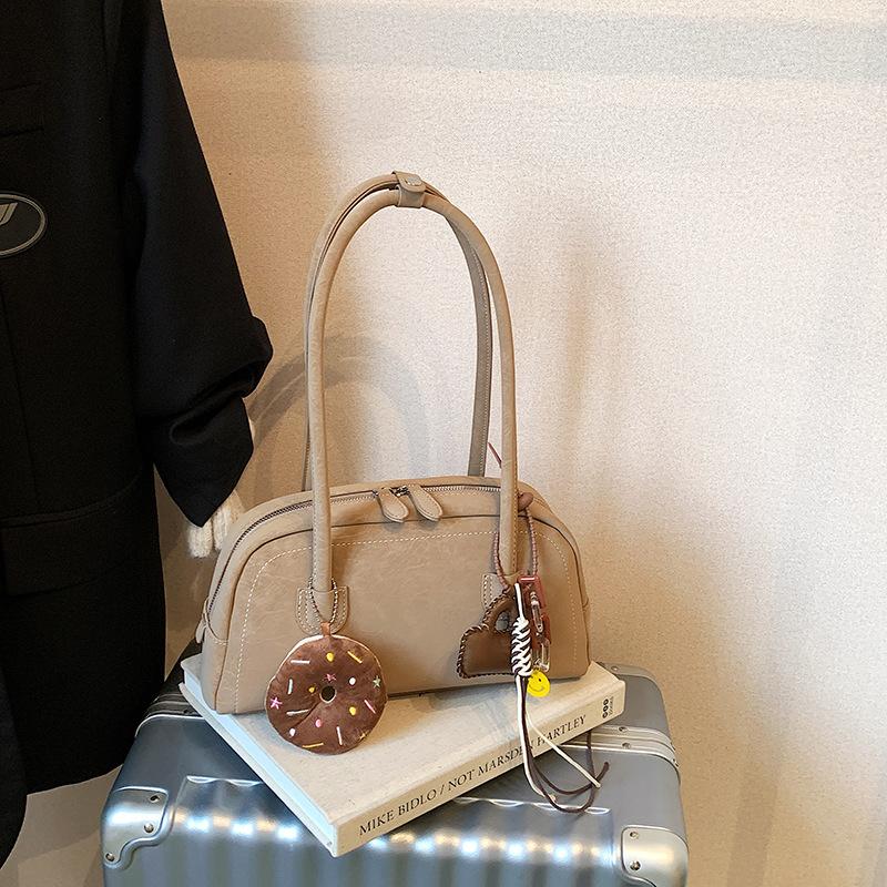 

Niche retro underarm bag women s 2025 new autumn shoulder bag large capacity commuter Boston pillow bag no pendant хакі