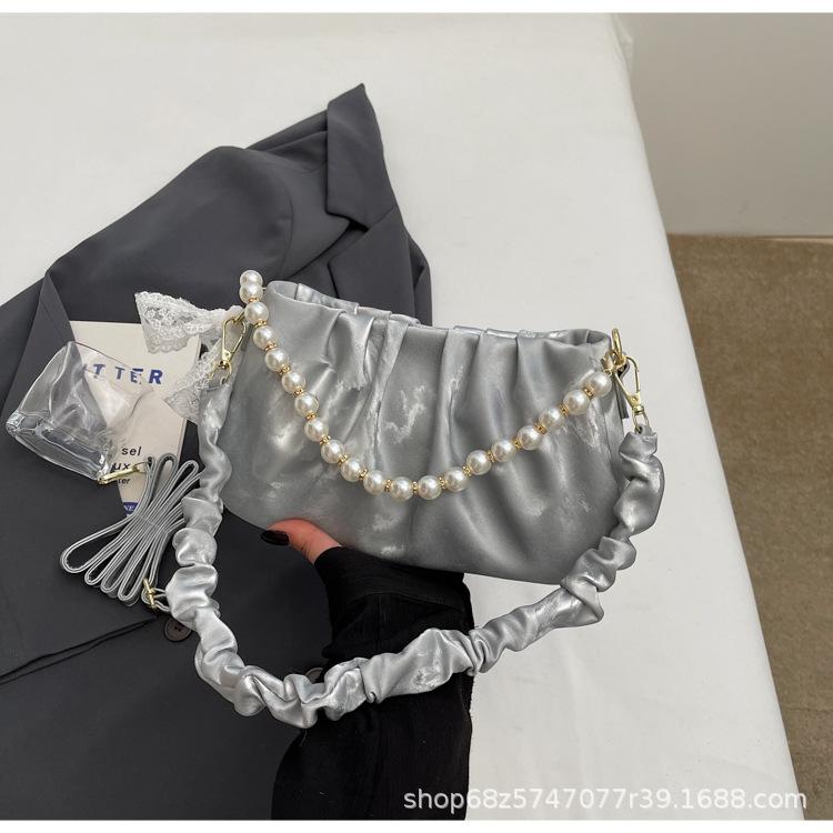 

French niche bag women s 2025 new summer fashion one-shoulder crossbody bag pleated women s bag hand-held small square bag