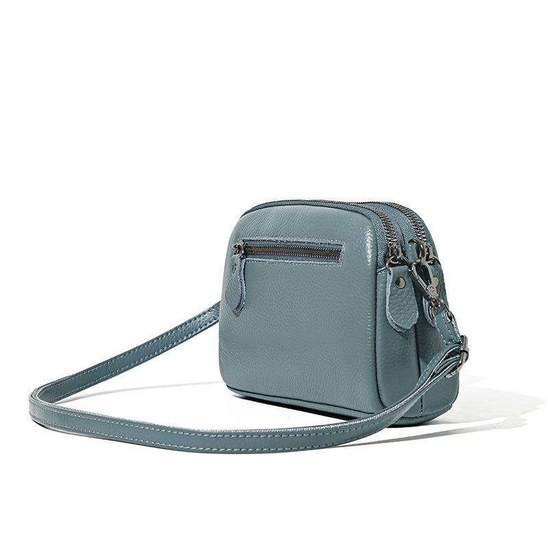 The first layer of cowhide women's bag, the new fashionable and versatile medium lady's mother shoulder messenger bag, small bag.