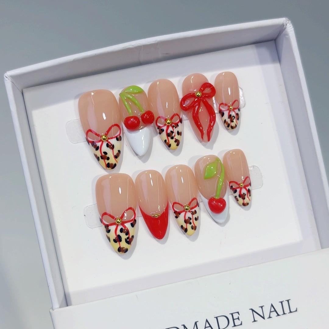 

Europe Foundation Red Bow Cherry Blossom Leopard Nail Art Tips Model L