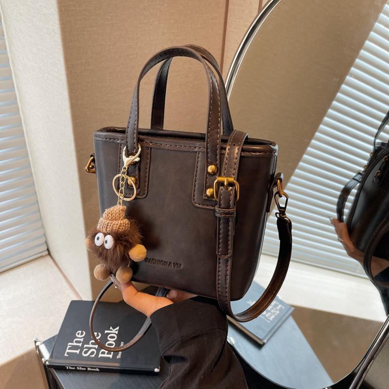 

Популярная маленькая сумка женская 2025 новая модная универсальная на плечо через плечо сумка-мессенджер текстурированная портативная сумка-ведро темно-коричневого