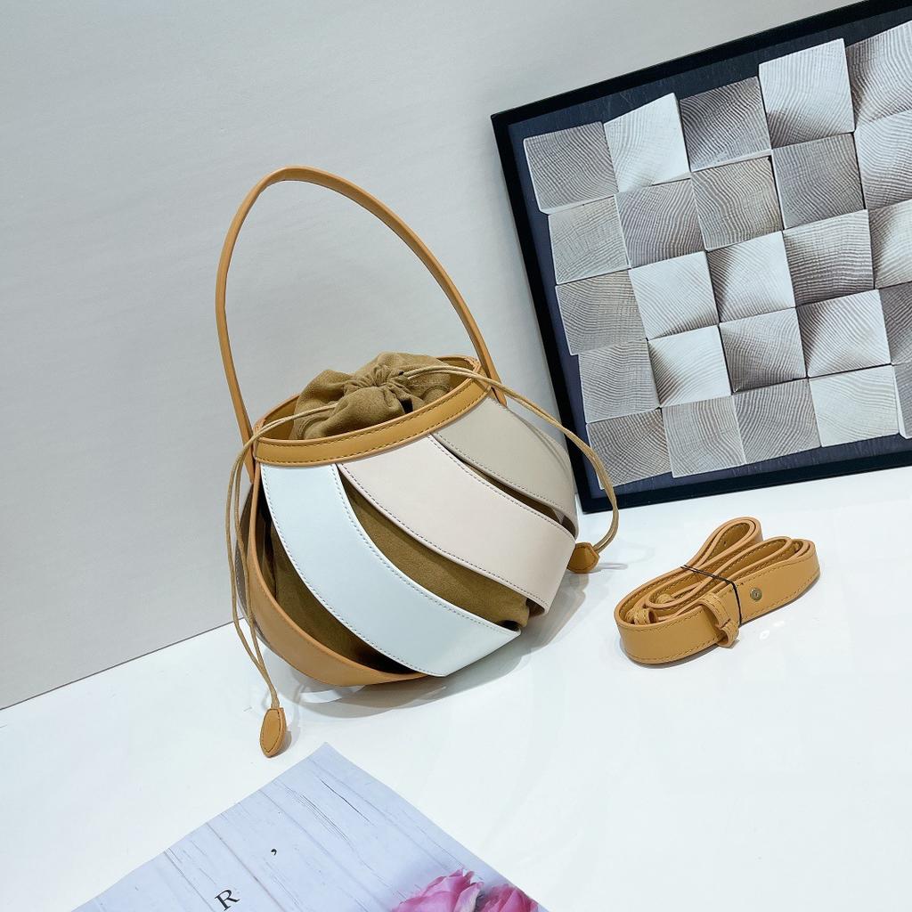 Women'S Pu Leather Balloon Bag Geometric Stitching Bucket Bag Cylindrical Shoulder Bag With Contrasting Color Premium