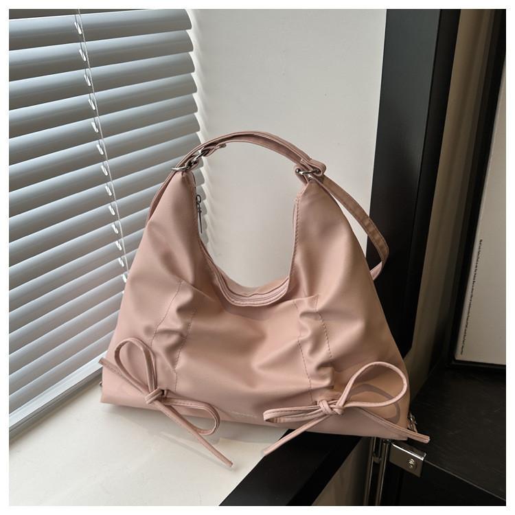 Modische Schmetterlingsschleife Große Kapazität Schultertasche 2024 Frühling Neuer Koreanischer Stil Street Trend Pu-Tragetasche