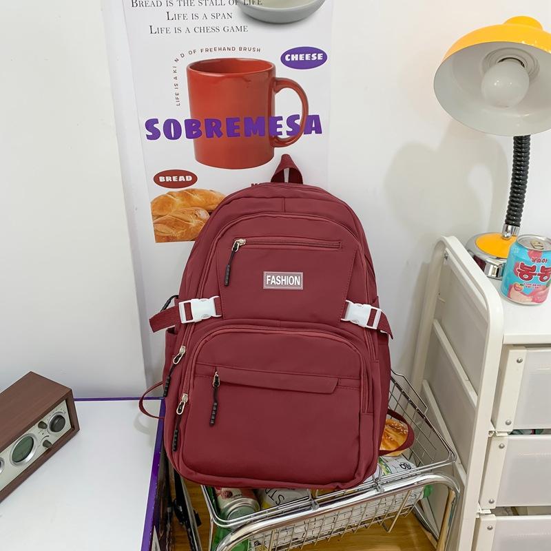 Schoolbag wholesale Korean version of casual large-capacity backpack, junior high school student schoolbag, solid color multi-layer Harajuku backpack
