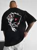 Unisex-T-Shirt mit Spielkartenmuster und überschnittenen Schultern