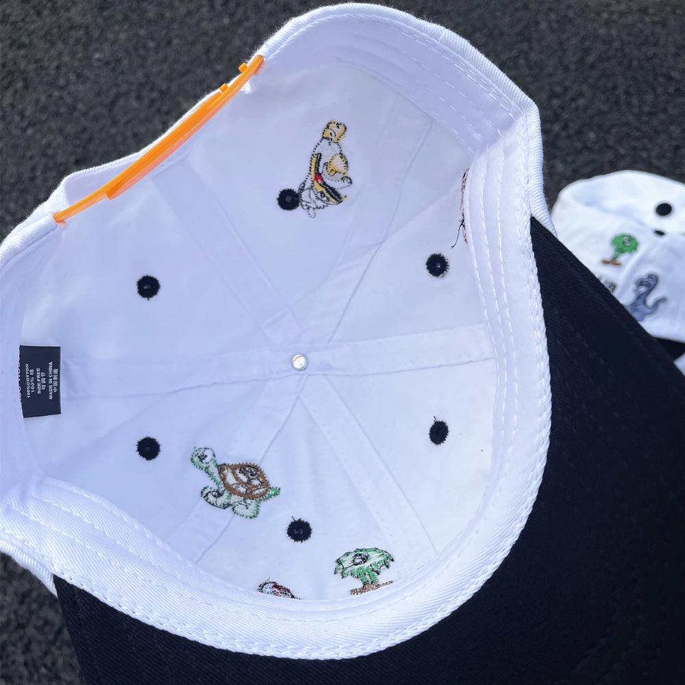 Czapka baseballowa w stylu retro z blokami kolorów, haftem i kreskówkowym zwierzęciem - Unisex miękki kapelusz, czarno-biały