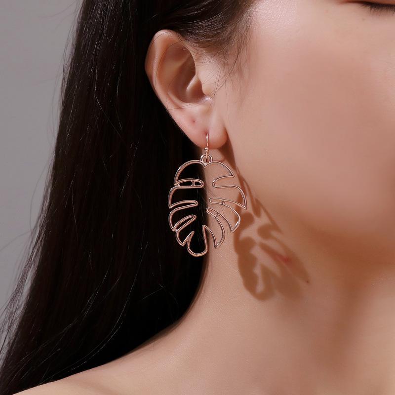 Ethnic Style Retro Hollow Leaf Stud Earrings - Banana Leaf Design for Women