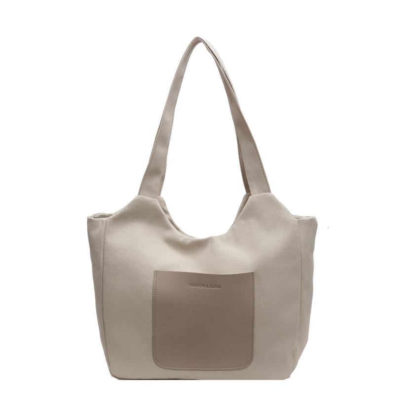 

Fashion contrasting color splicing handbag bag women s urban simple commuter shoulder bag large capacity student class canvas bag One size світлого кольору хакі