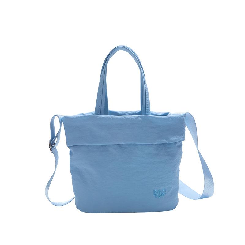 

Niche canvas bag women s 2 new fashion versatile portable bucket bag simple student commuter messenger bag