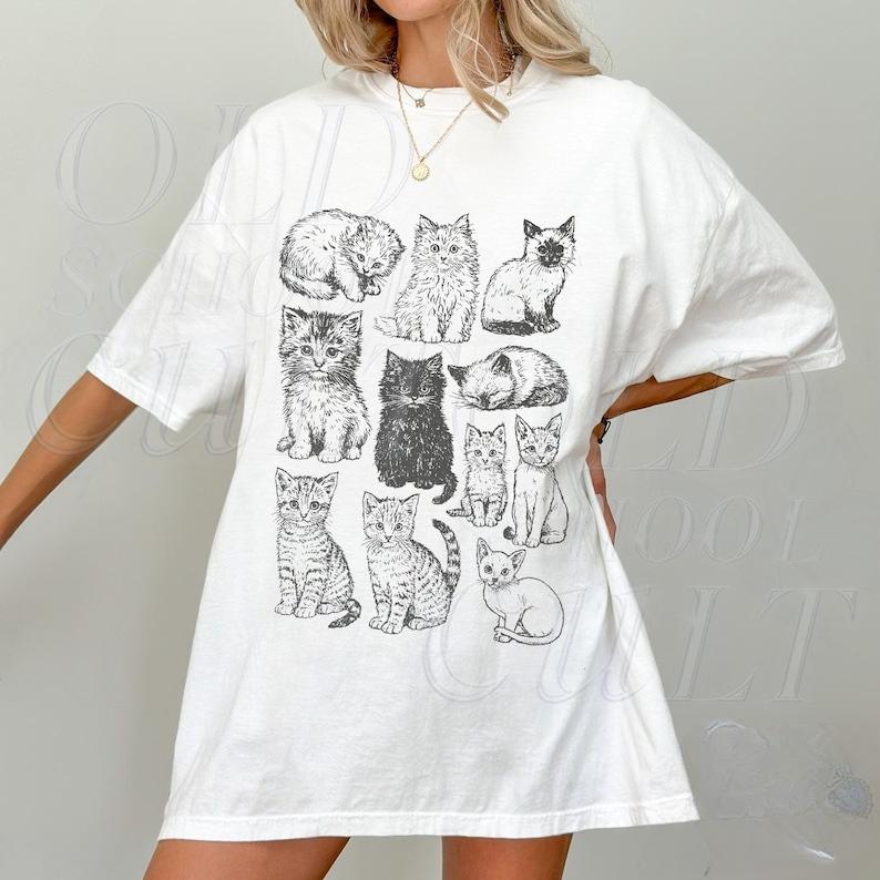 

Кошки 90-е Винтажная с принтом Высококачественная футболка Унисекс Милый кот Короткий рукав Ретро Уличная мода Y2K Повседневные модные топы Одежда S