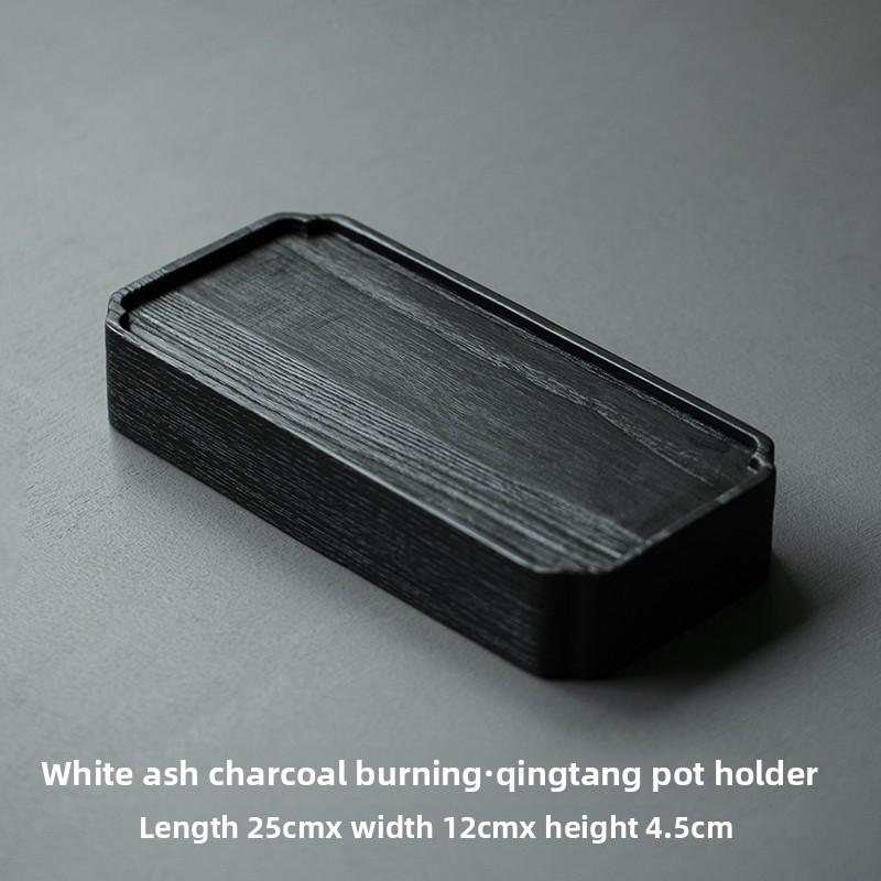 

A Japanese-style charcoal-fired tea tray made of ash wood, a rectangular dry-brewing tea stand, and a small tea tray