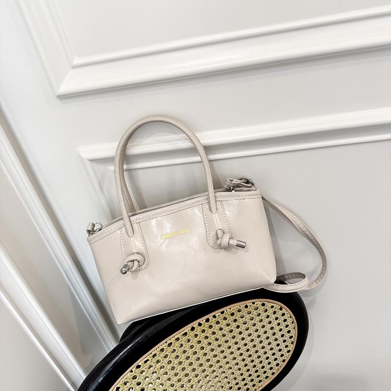 New retro niche design portable bucket bag temperament personality simple casual messenger bag bag women