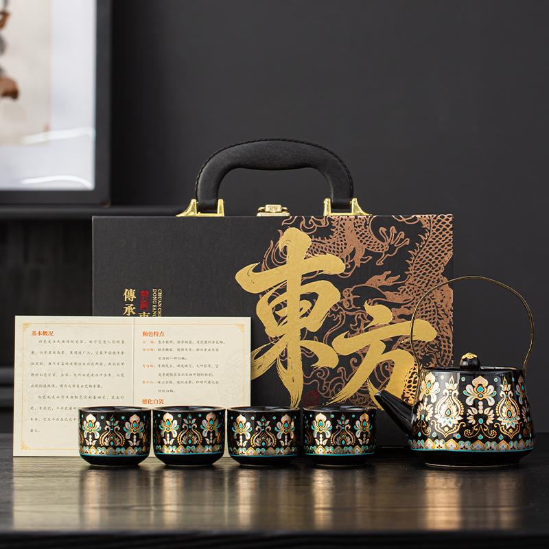 Oriental Guochao gold and silver wrong black pottery lifting beam pot tea set gift box gift tea pot one pot four cups lo