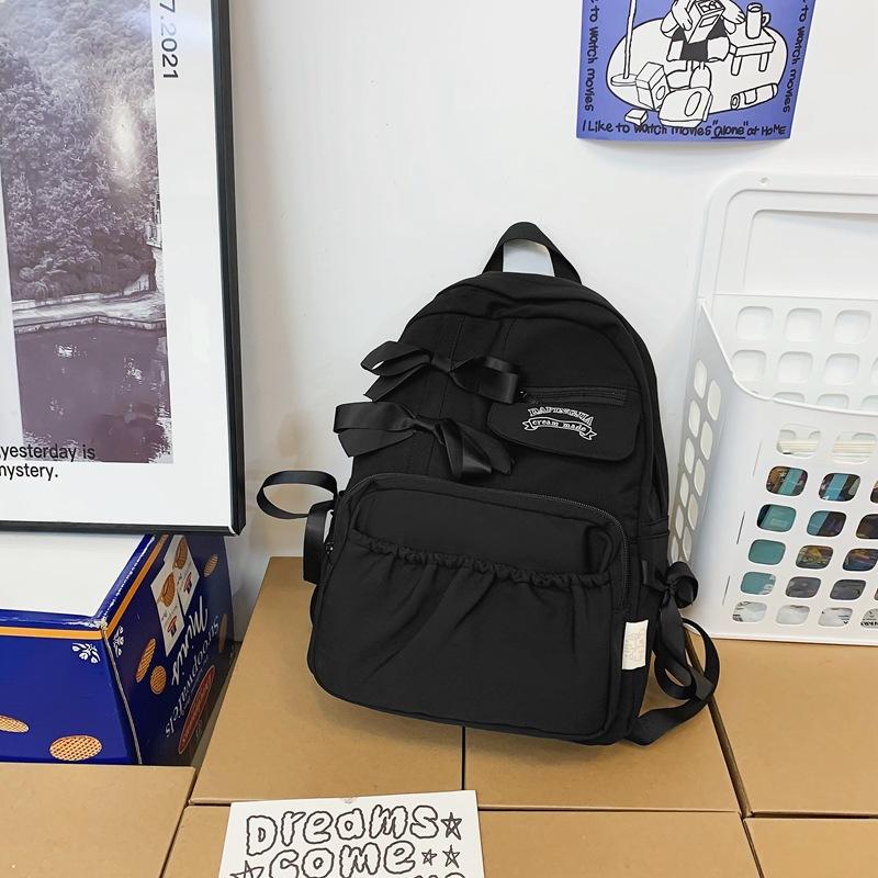 

Japanese ins cute girl bow schoolbag female junior high school student high school student high value milk white backpack чорний