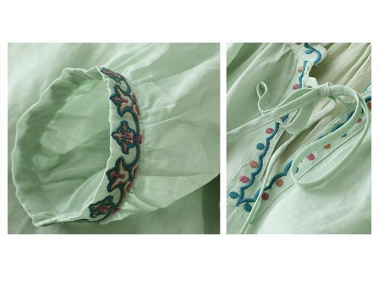 Damen Baumwoll- & Leinen besticktes V-Ausschnitt Sommeroberteil mit Dreiviertelärmeln und Bindekragen.