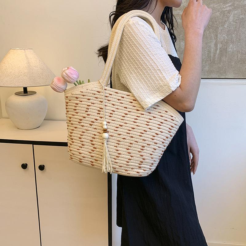 2025 summer new temperament literary large-capacity woven bag multi-functional foreign style portable underarm beach bag