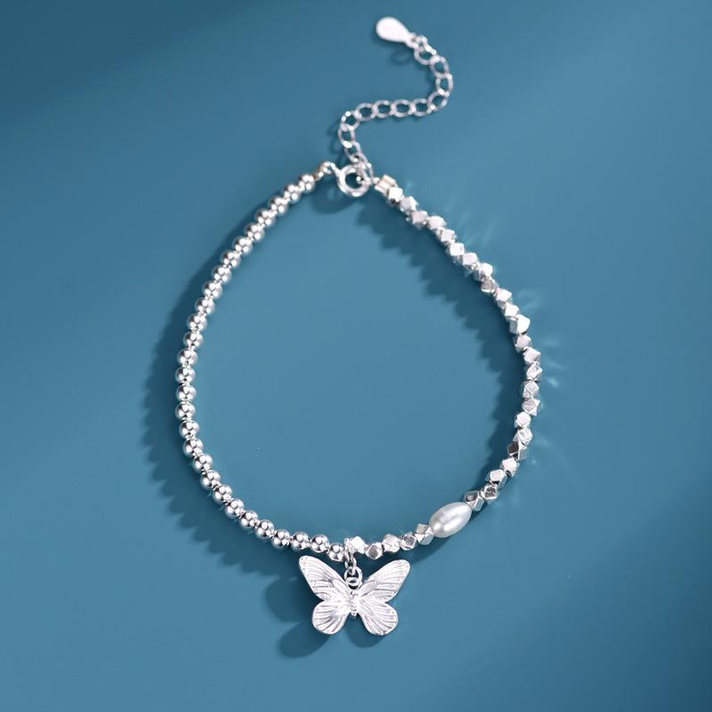 Trendy Silver & Pearl Butterfly Pendant Bracelet for Women