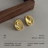 Medieval vintage earrings retro hammer pattern hollow relief gold and silver geometric niche light luxury earrings