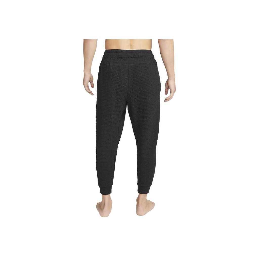 Nike Pánské pánské kalhoty s masivním texturovaným logem a stahovací šňůrkou černé DV9886-010