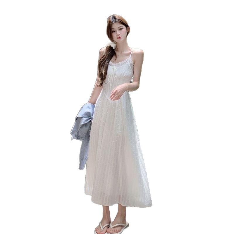 Pure desire wind lotus leaf edge sleeveless floral suspender dress women's summer new waist and thin temperament a word long dress