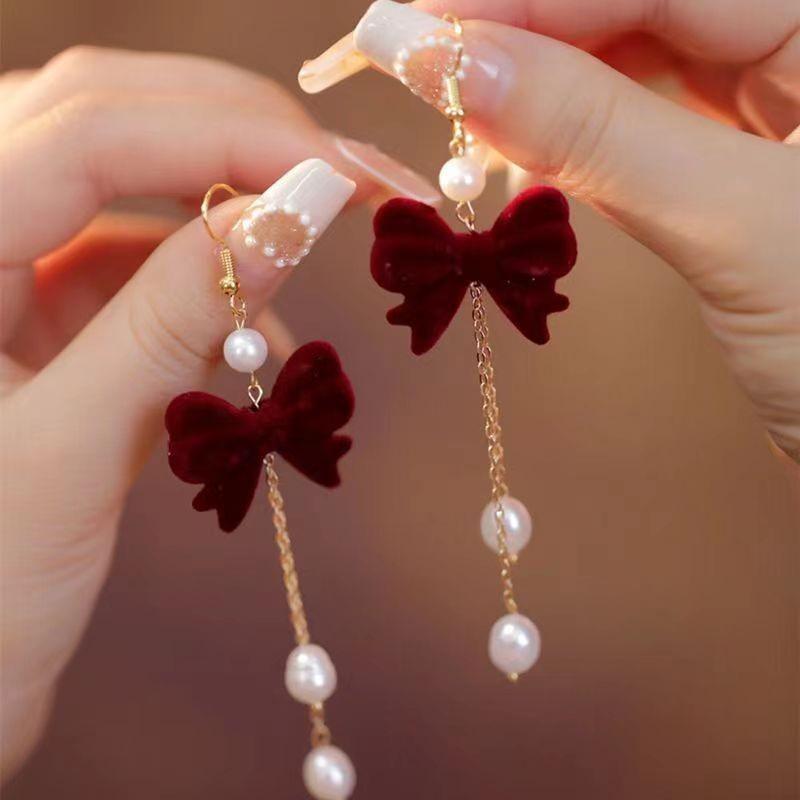 2025 New Year Red Velvet Pearl Earrings: Retro Hong Kong Style Whitening Studs for Women