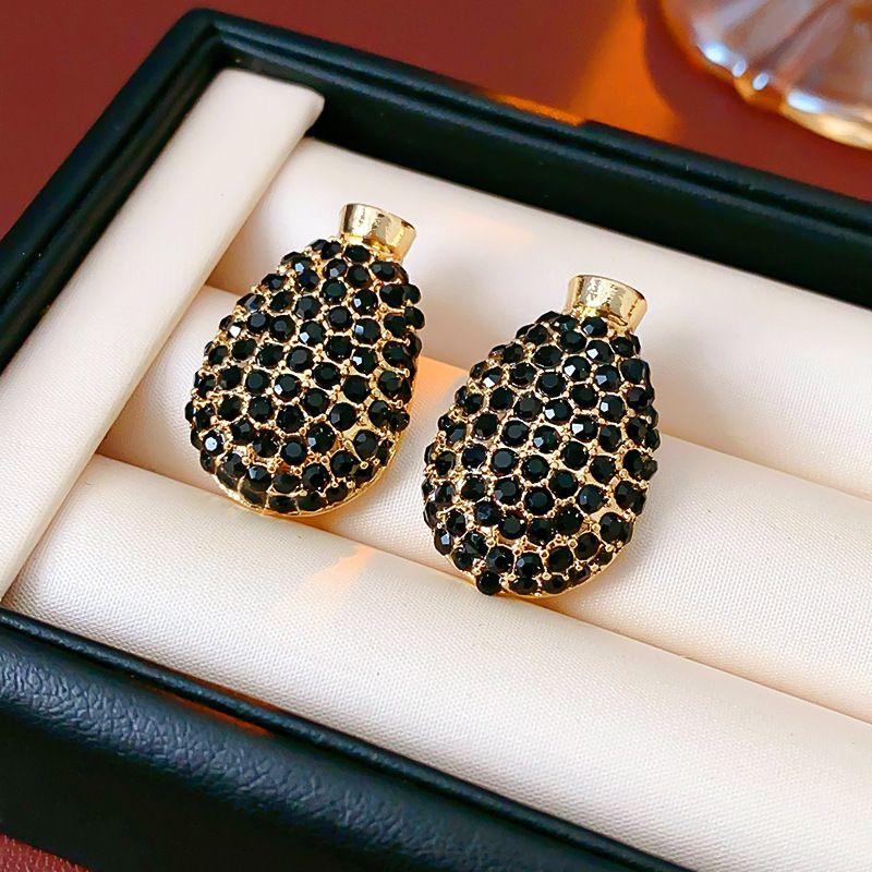 

Мода Мода Преувеличенные Серьги и Ожерелье Комплект Инкрустированный Драгоценный Камень Стразы Цепочка на Ключицу Женское Платье Банкет Невеста Украшение Silver Needles-Gold Black OTHER