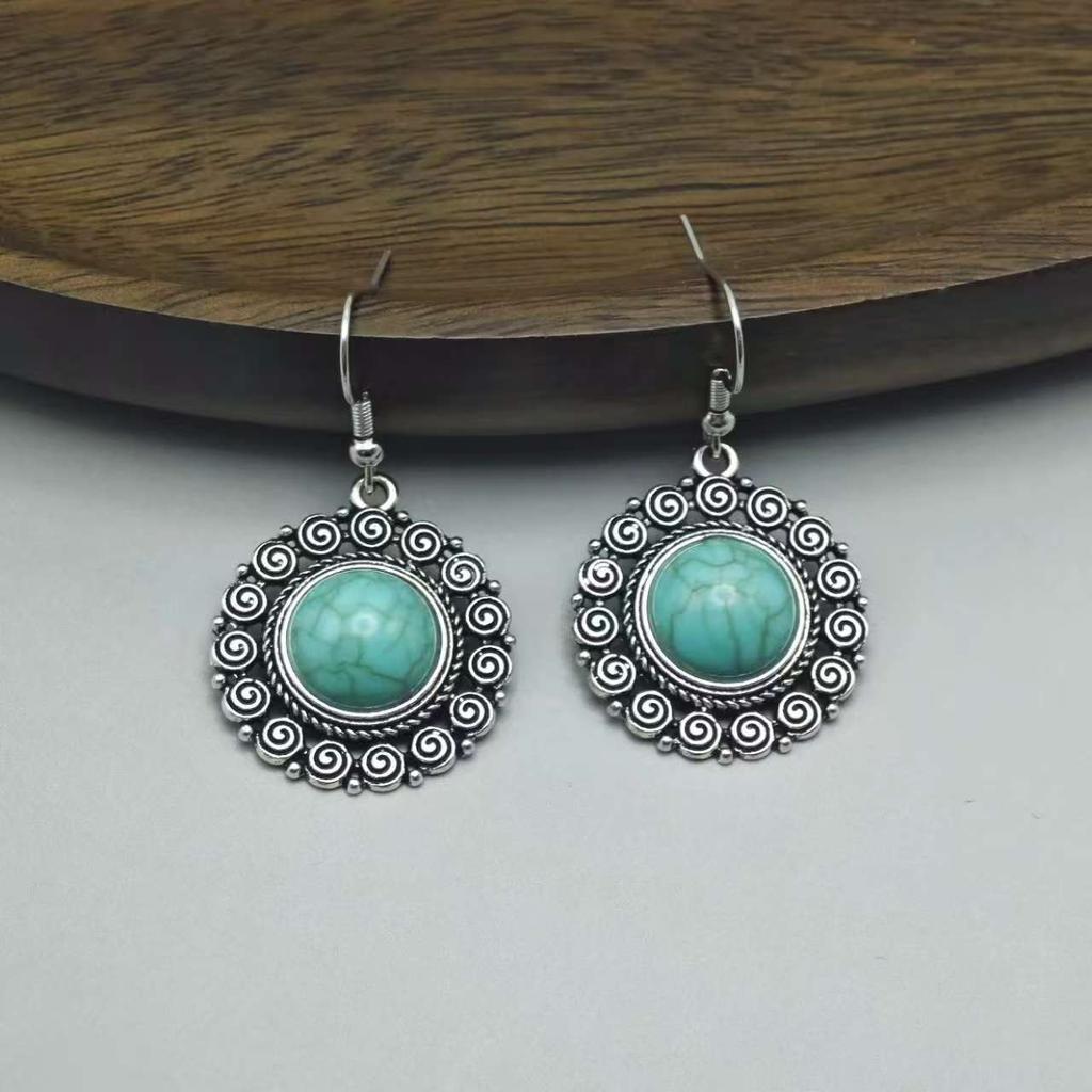 Böhmische ethnische Ohrringe Türkis geometrische hohle Fransenohrringe Ohrringe Frauen