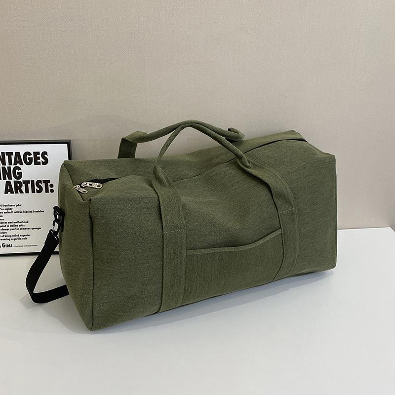 Thickened and sturdy canvas travel bag, moving bag, duffel bag, handbag, business trip travel bag, large capacity, long and short-distance bag.