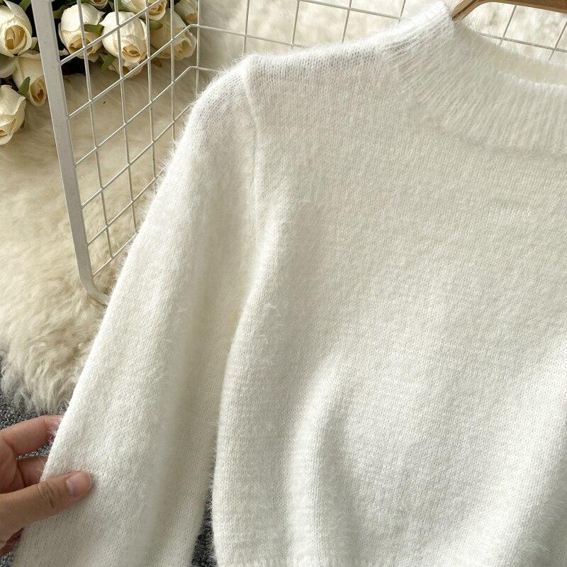 Autumn And Winter Fashion Short Long-Sleeved Knitted Sweater + Hip Short Skirt Two-Piece Set