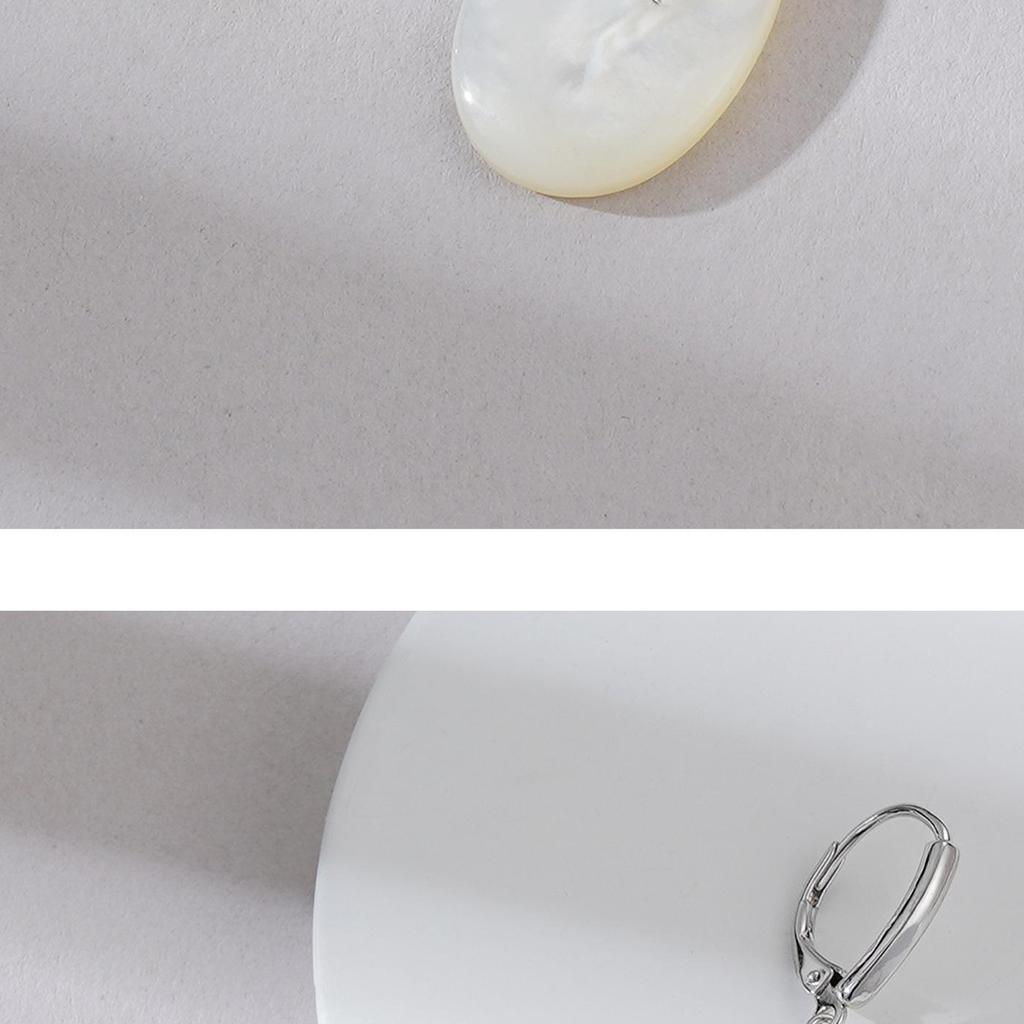 Exquisite Mother-of-Pearl Sterling Silver Luxury Earrings with Unique Face-Inspired Design