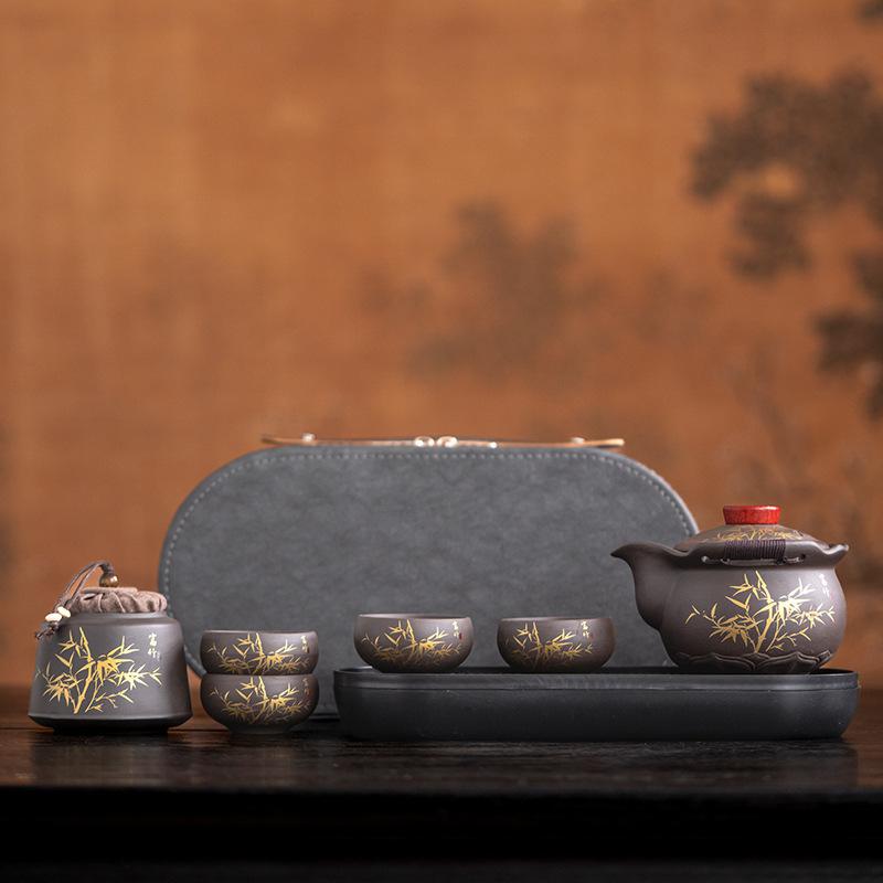 Purple sand hand-held pot travel tea set with tea tray, portable outdoor one pot and four cups of express cup as a gift.