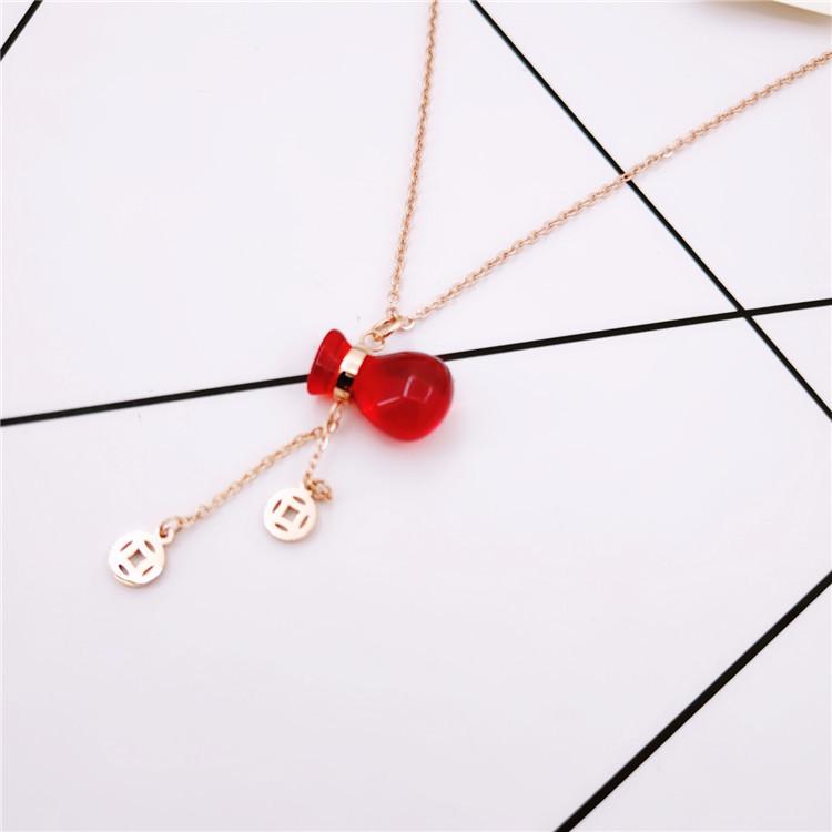 Rose Gold Plated Titanium Steel Pendant Necklace with Red Diamond Money Bag Gourd Design for Women