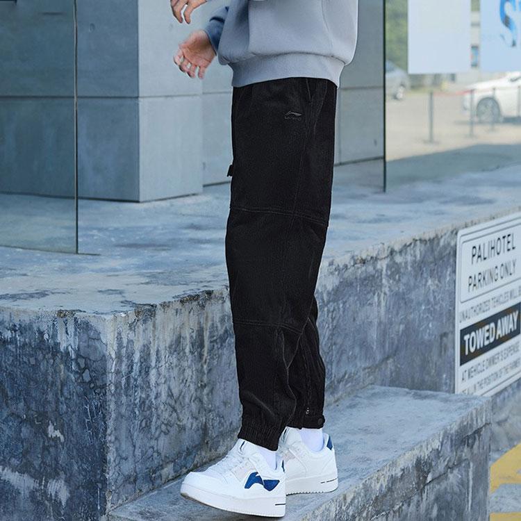 Li Ning Logo Patch Loose Fit Cuffed Casual Long Pants Knitted Sports Pants Men Bottoms Black AKXR459-1