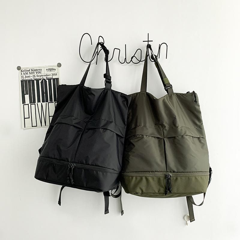 Korean version portable simple solid color locomotive backpack Sufeng large capacity shoulder backpack