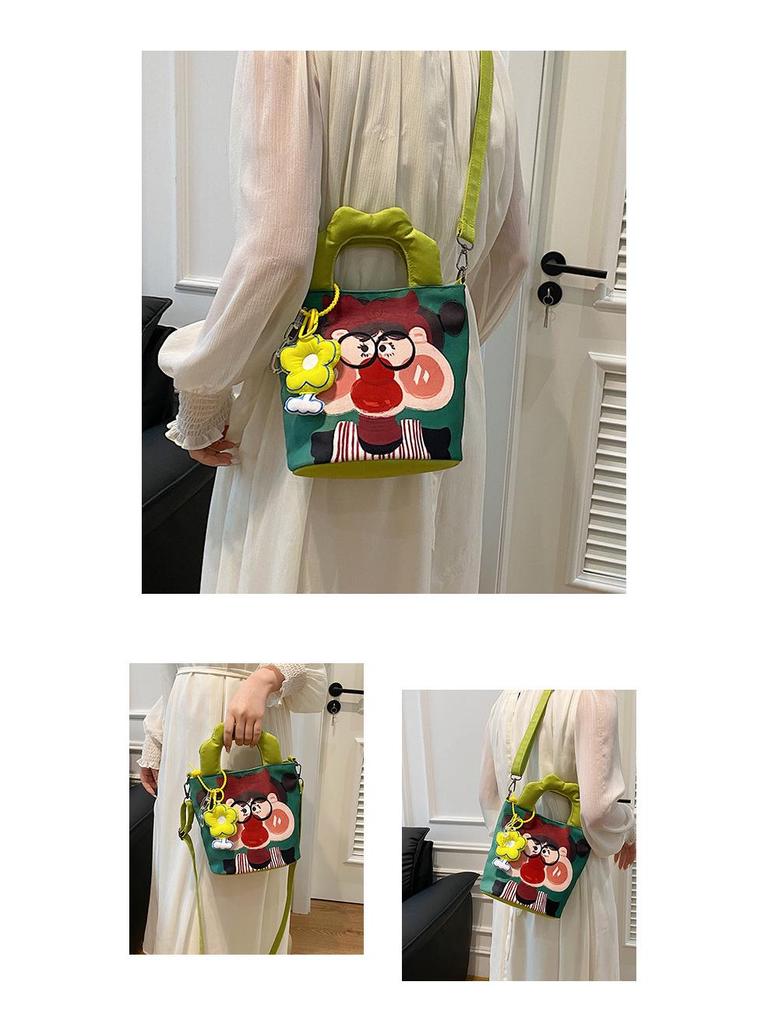 2025 Grenzüberschreitende Cartoon-Graffiti-Handtasche: Nischendesign Bucket Schulter- & Umhängetasche für Damen