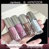 HYNTOOR Black Rabbit Future Planet Lip Gloss: Exfoliating & Smoothing Lip Oil with Mirror Shine Finish.