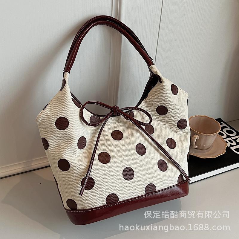 Hand carrying retro casual tote bag women's 2025 new Korean version trendy fashion polka dot underarm bag large capacity women's bag