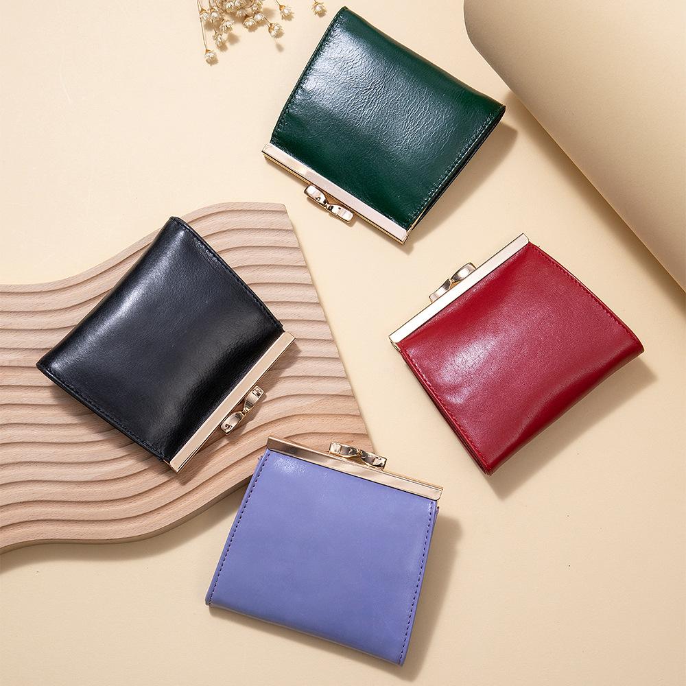 New first layer oil wax cowhide retro clip buckle change bag women's ID card clip business card bag multi-card card bag